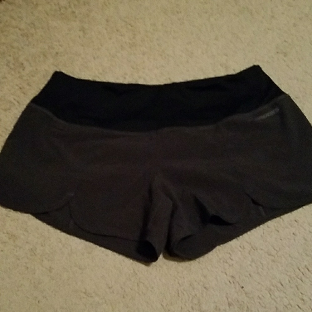 Brooks running shorts.