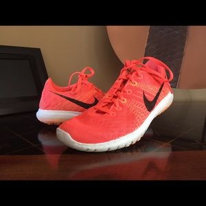 Peach Nike shoes
