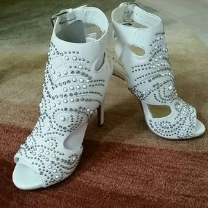 Bebe white laser cut bootie heels