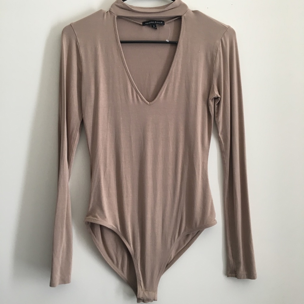 Kendall and Kylie- beige bodysuit w/ cut out neck
