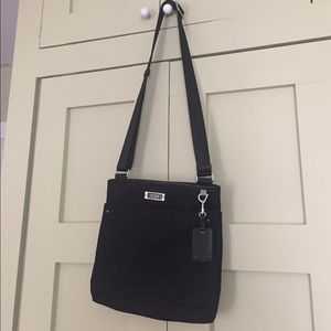 Tumi black cross body bag