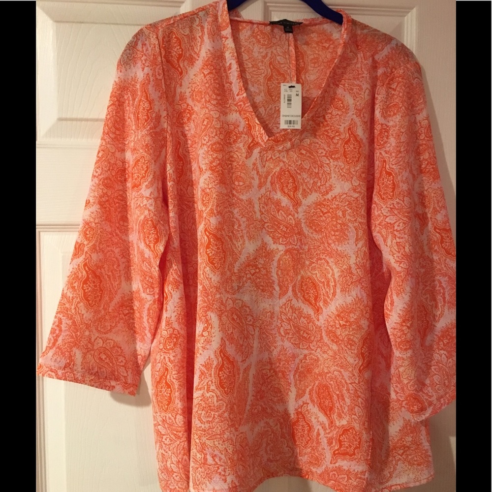 Orange and white top