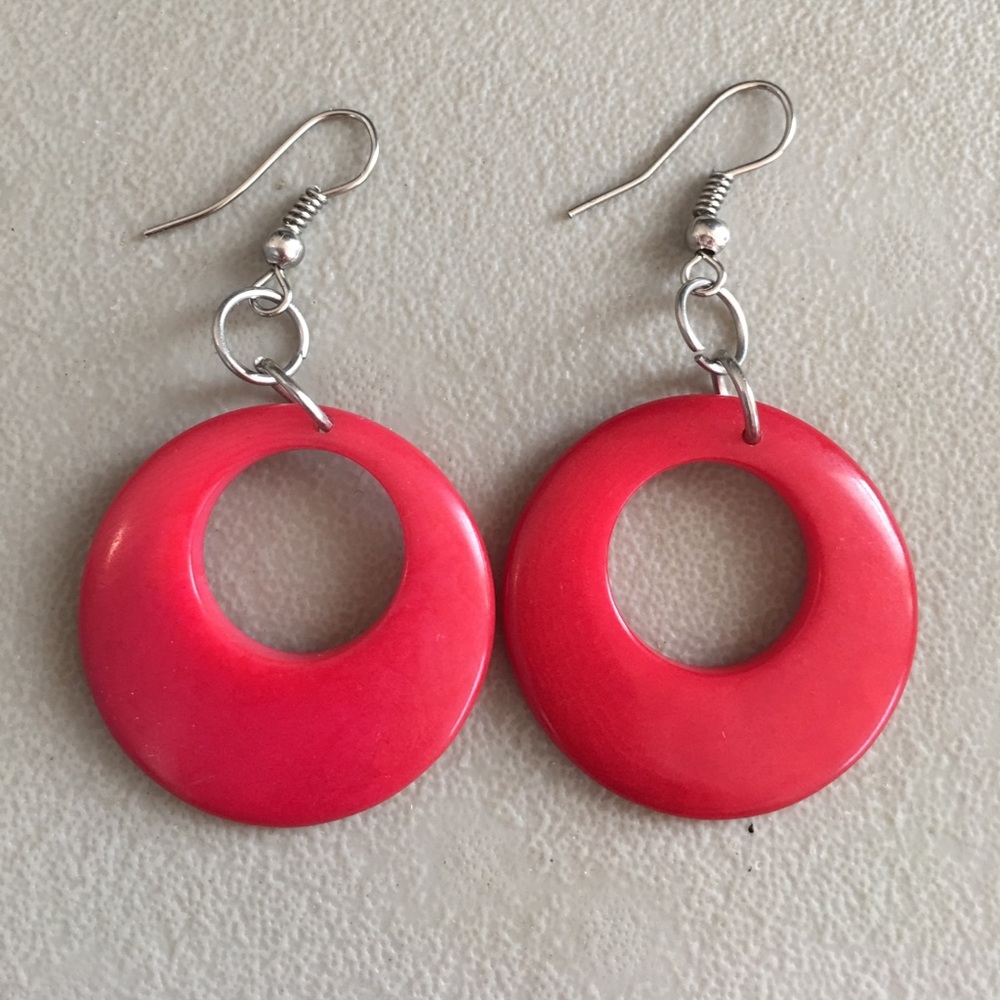 Upcycled red plastic earrings.