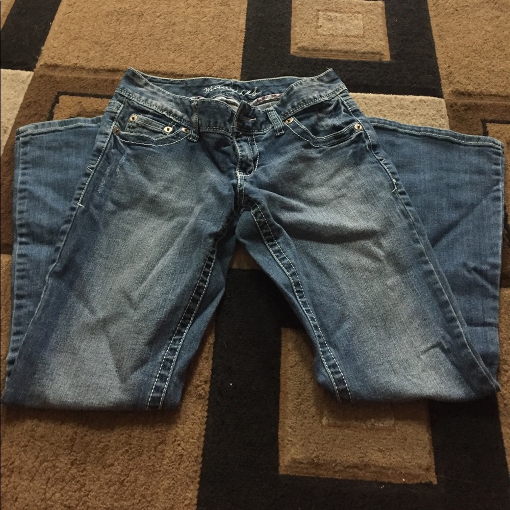 Faded boot cut blue jeans