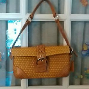 Purse basket weave style.