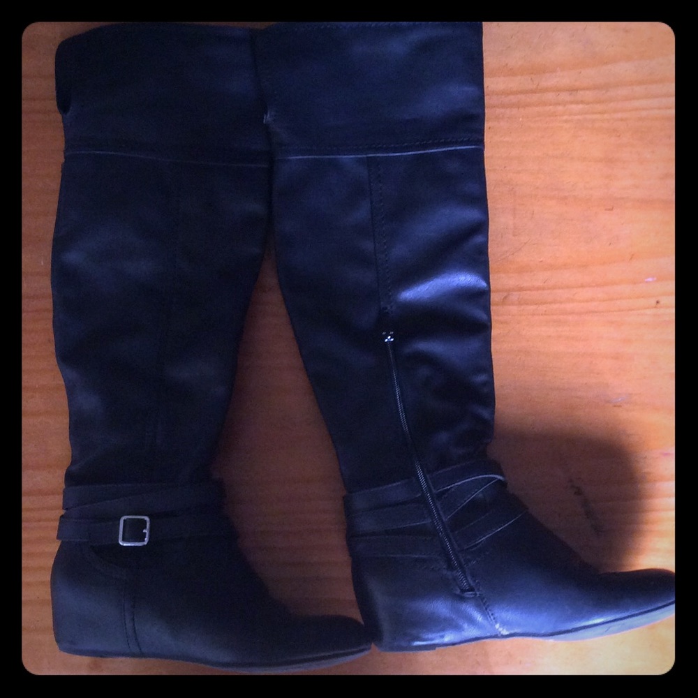 Fergalicious knee high boots.