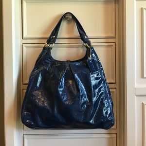 Coach patent leather- navy.  Excellent condition.
