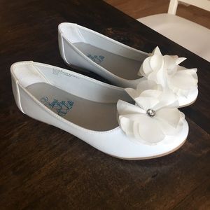 White slight heeled flats