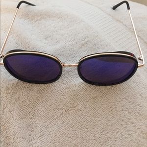 Large blue/green sunglasses