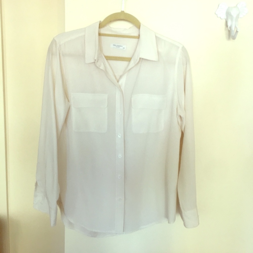 White equipment blouse