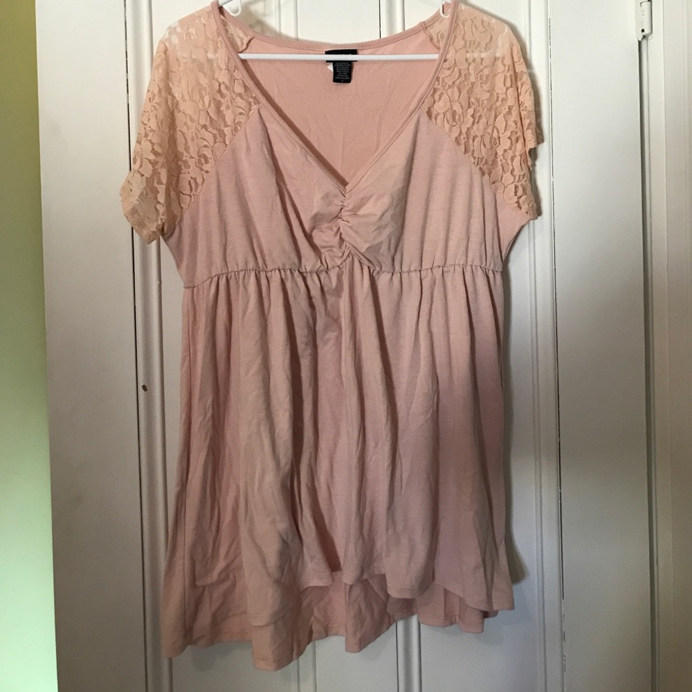 Torrid pink, lace sleeved top.