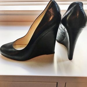 Christian Louboutain black leather wedges