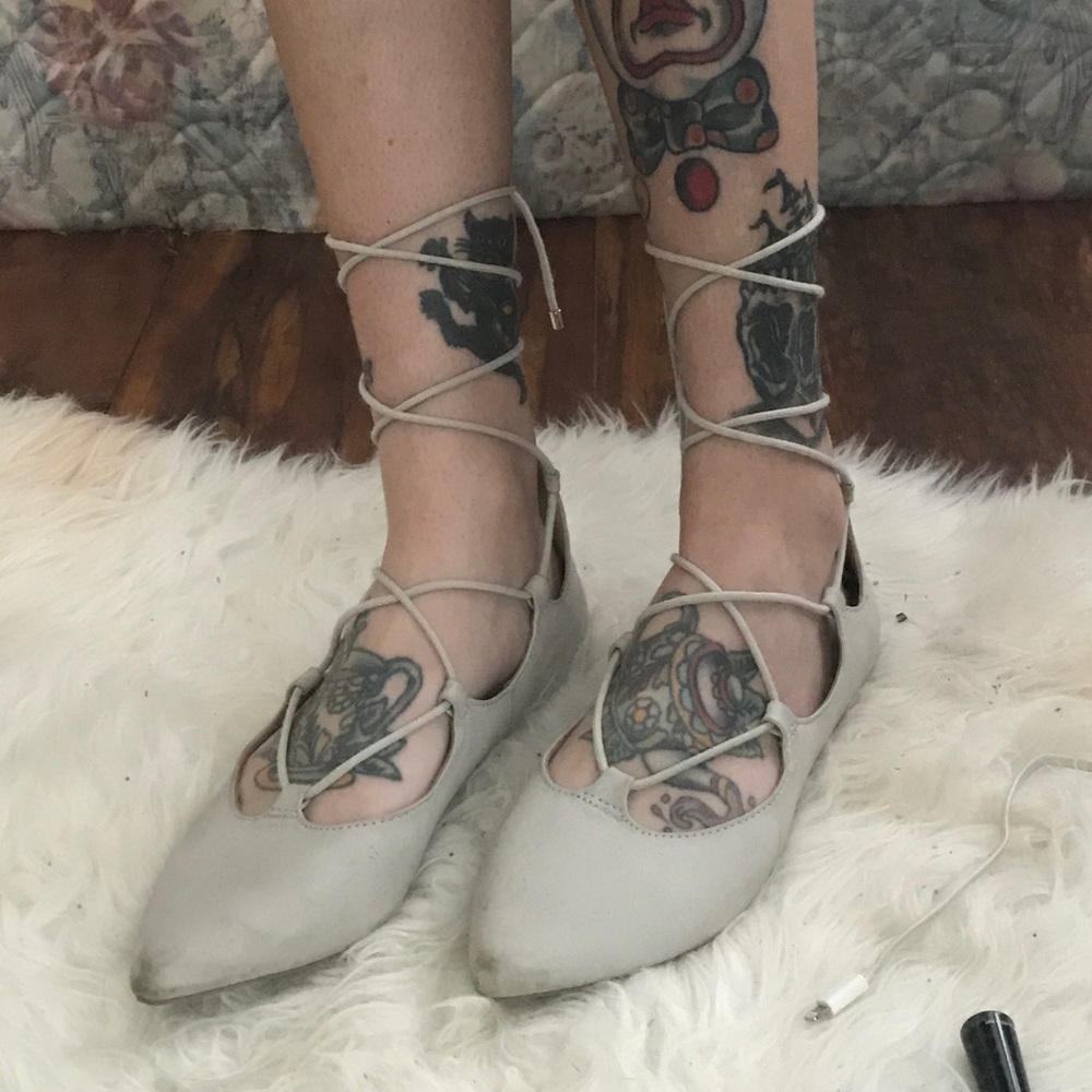 Pointed lace up flats