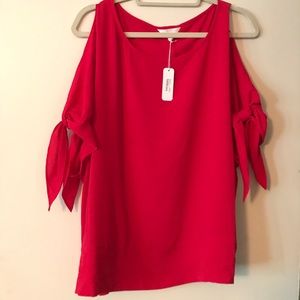 Cold shoulder top with tie sleeves