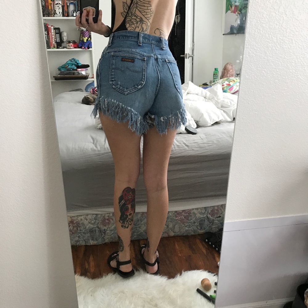 High waisted fringed denim shorts