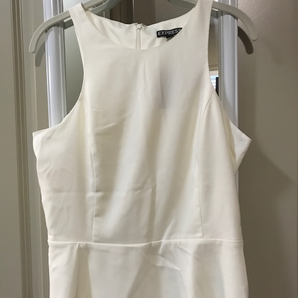 Express off white/cream peplum top.