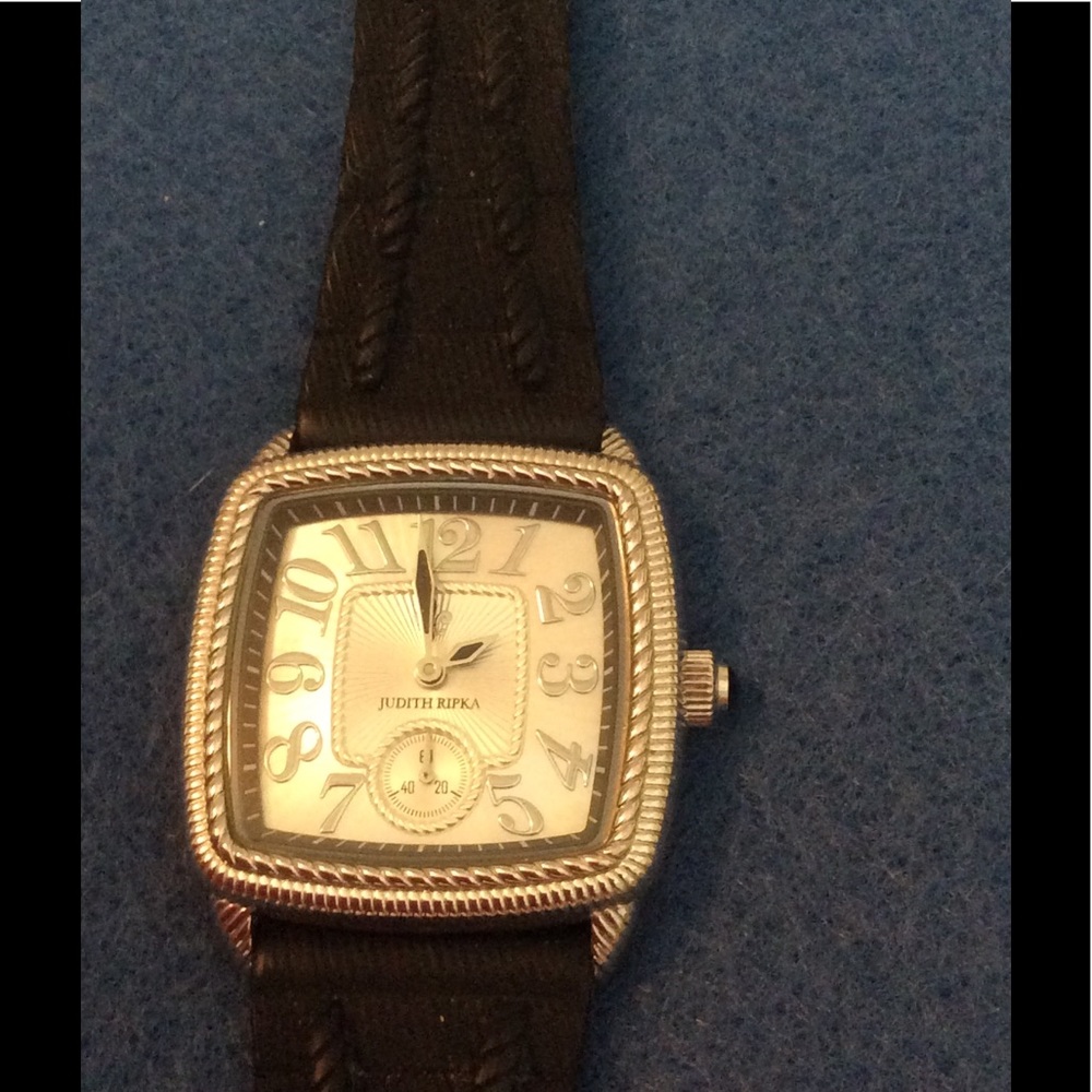 Black silicone Judith Ripka watch.