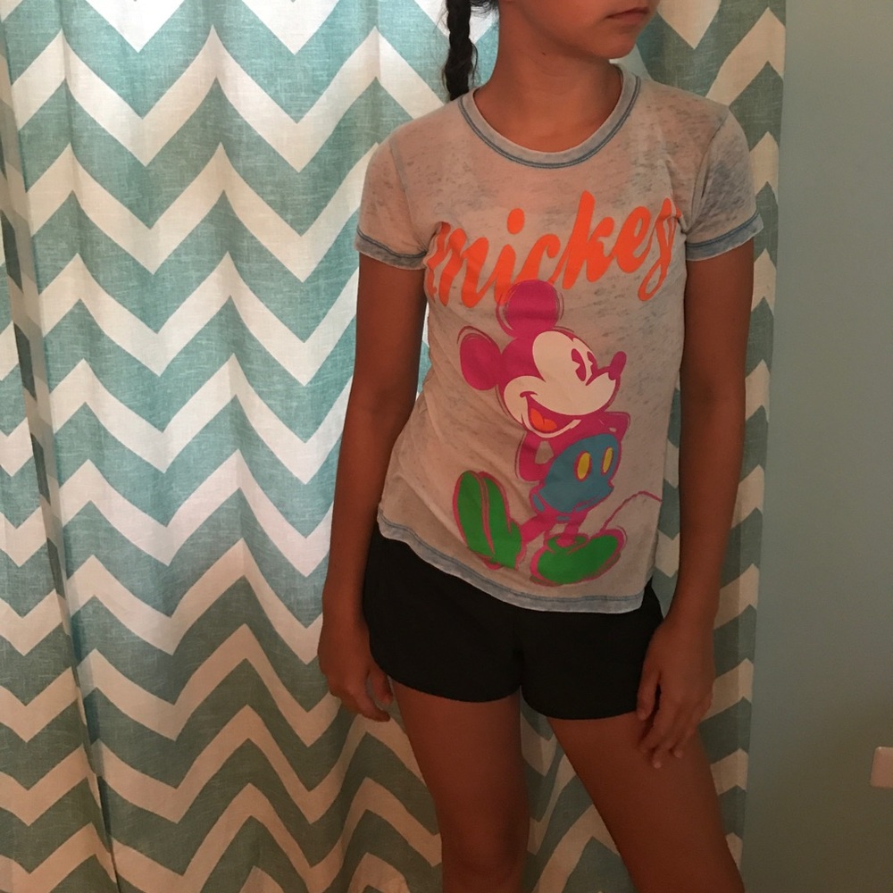 A Kid's Disneyland Mickey Mouse T-Shirt.