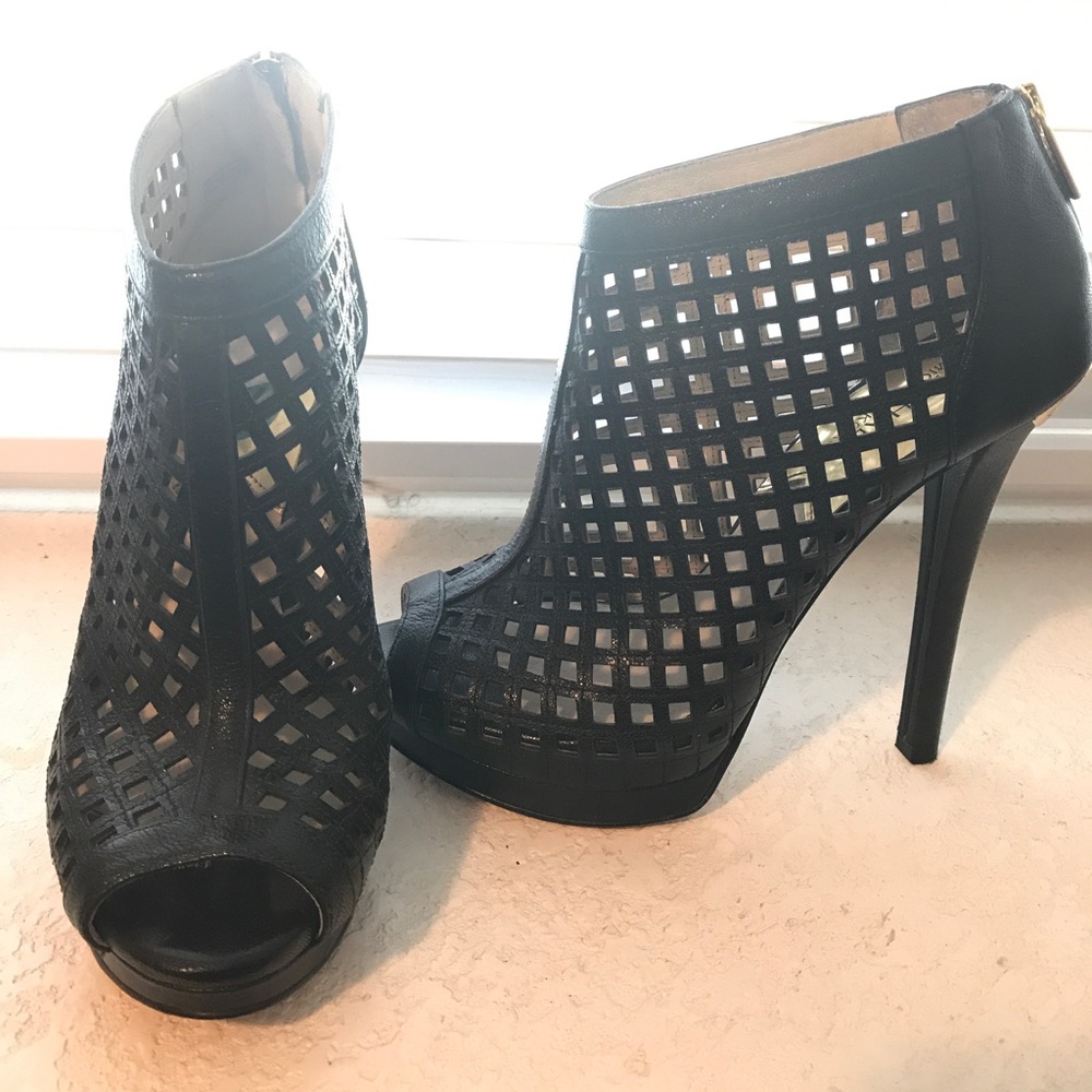 Micheal Kors peep toe booties.