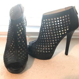 Micheal Kors peep toe booties.