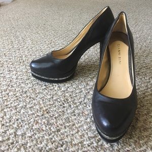 Black platform pumps