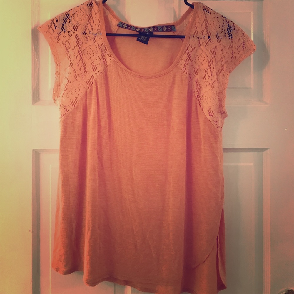 Pastel pink short sleeve top.
