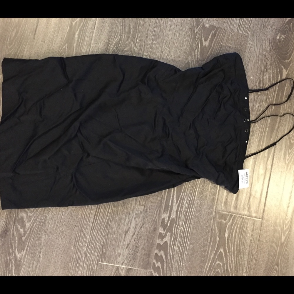 Black dress with spaghetti strap halter top.