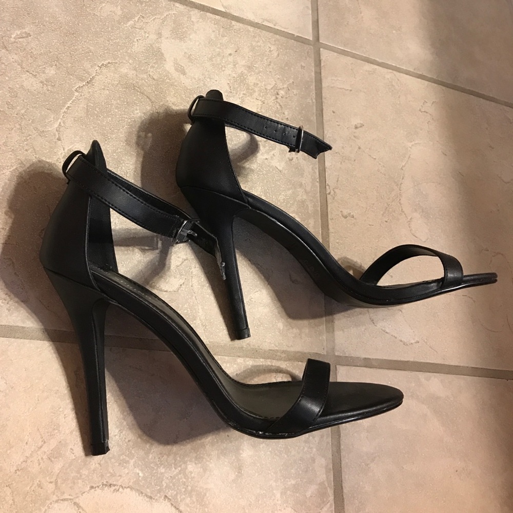 Size 9 Black 4 in. Heels with strap around ankle