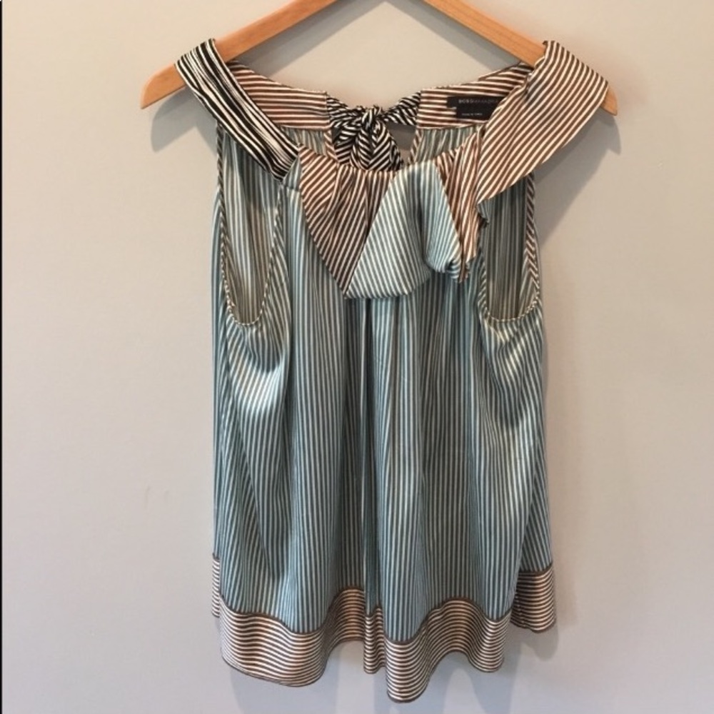 BCBG Asymmetrical stripped top.