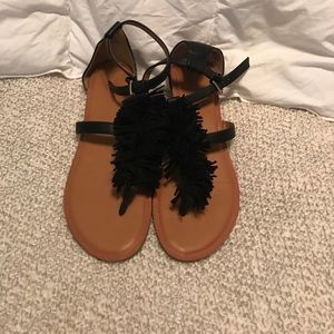 Black fringe sandals