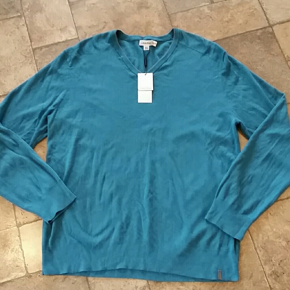 Calving Klein sweater