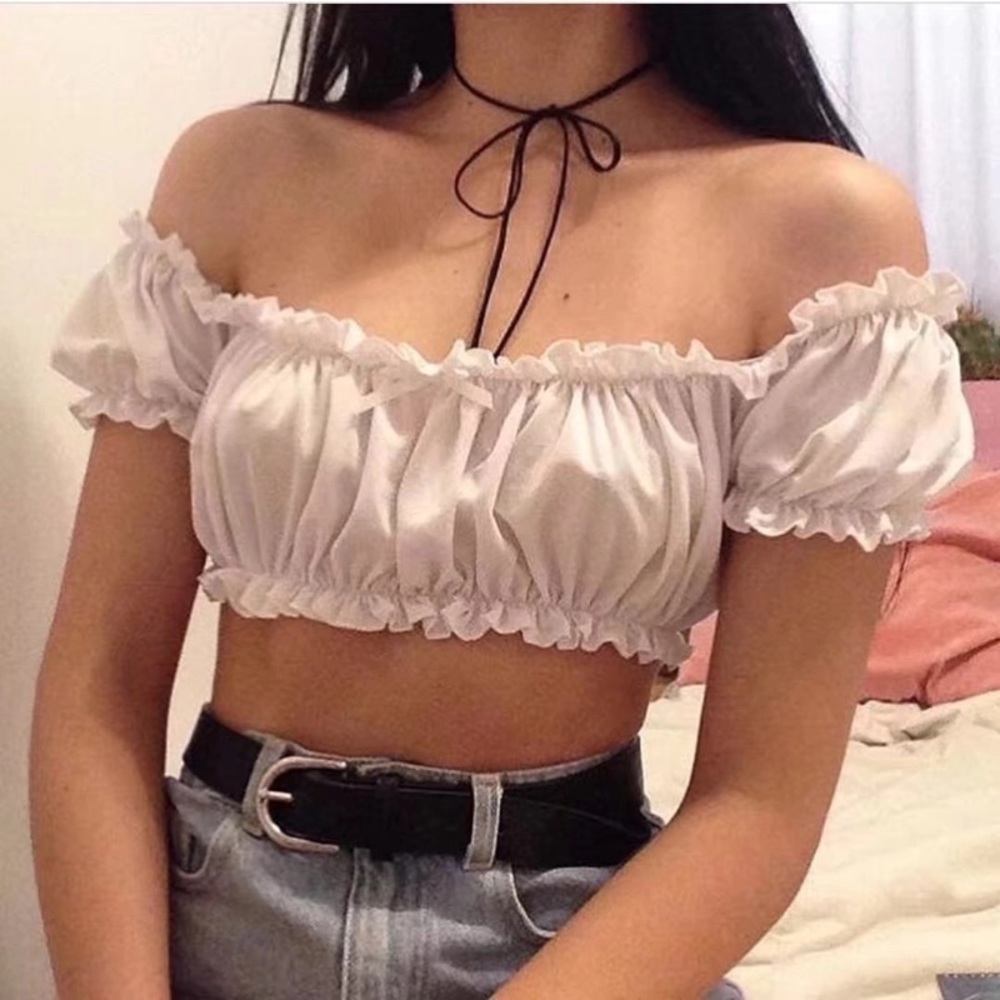 White sleeveless top