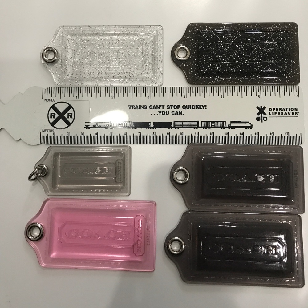 Coach lucite POPPY tags; make offer