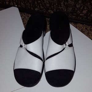 White slip on sandals. New. Never worn
