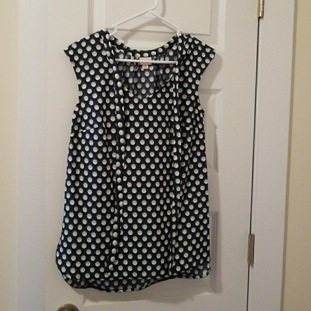 Sleeveless geometric print blouse with necktie