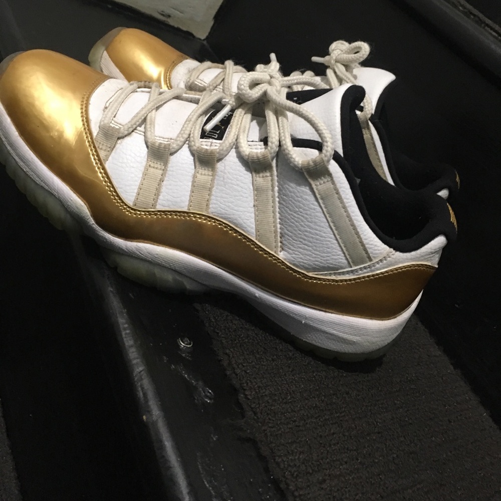Gold jordan 11 lows used