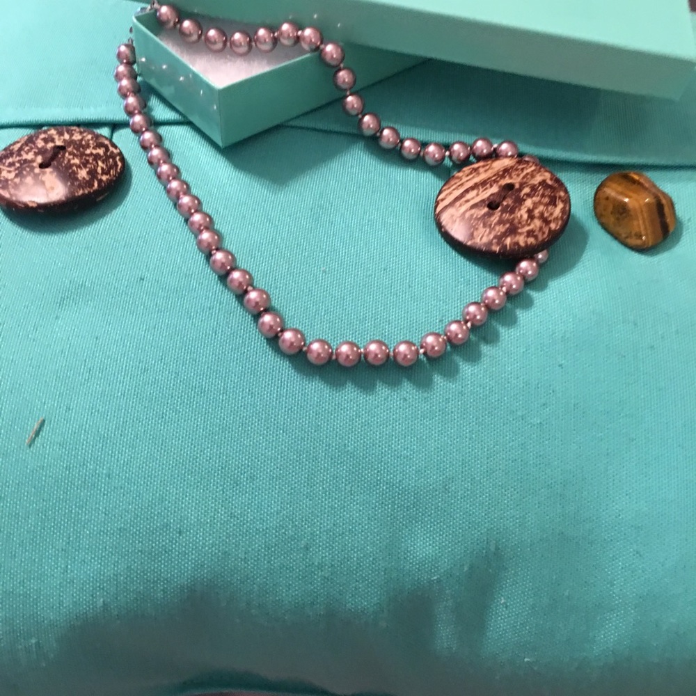 Champagne or light brown pearls