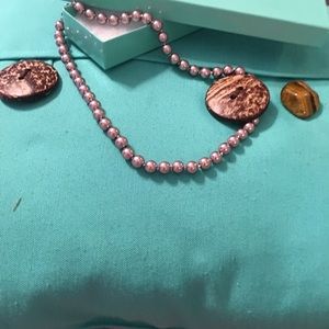 Champagne or light brown pearls