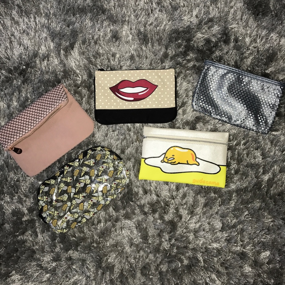 Large navy and cream canvas bag with ipsy bags