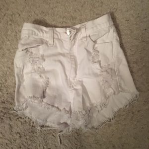 White, high-waisted, ripped jean shorts