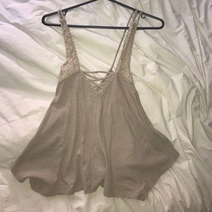 Flowy tan tank top w/lace and criss cross straps