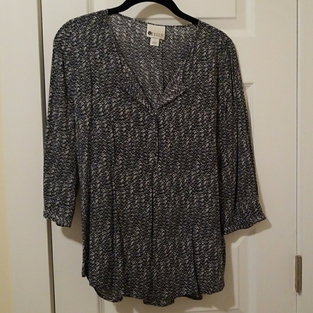 Black-and-white pattern top with button front