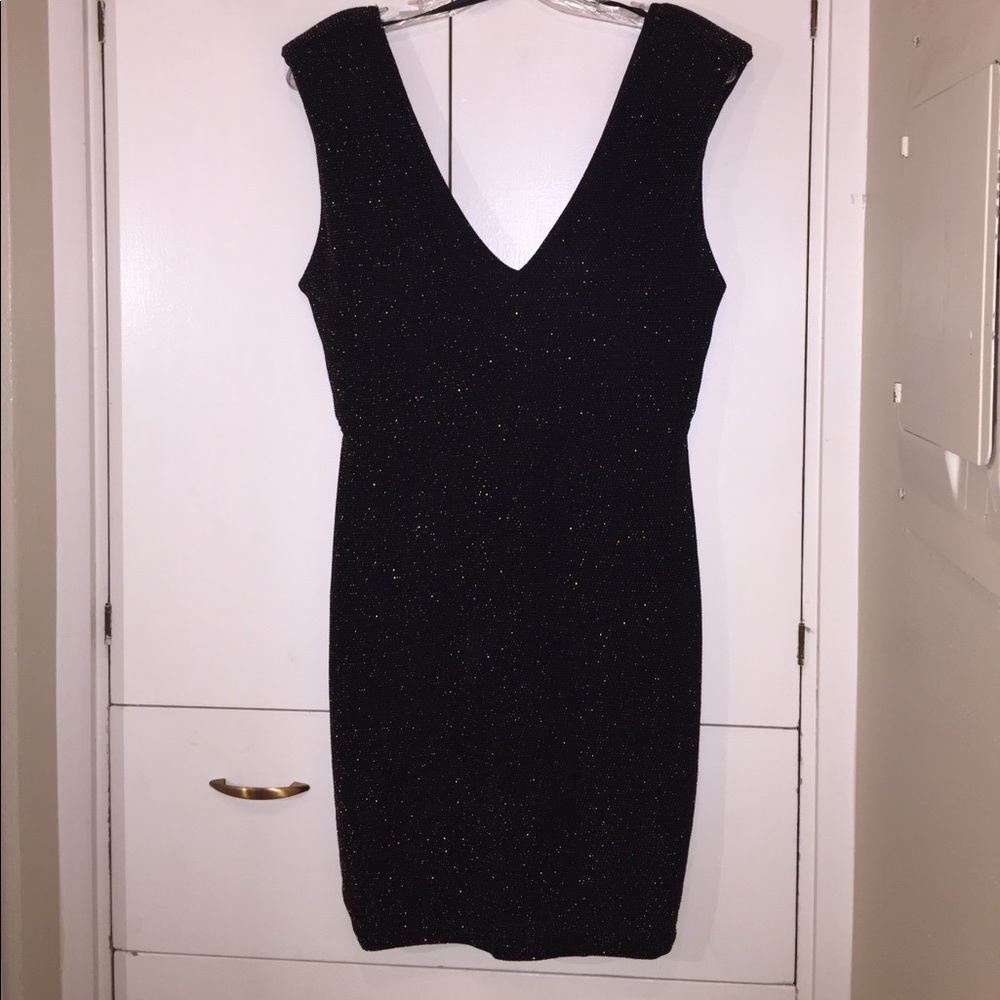 Sparkly, stretchy, little black dress