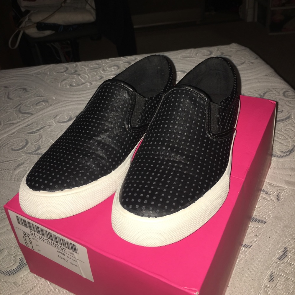 Black leather slip-on shoes