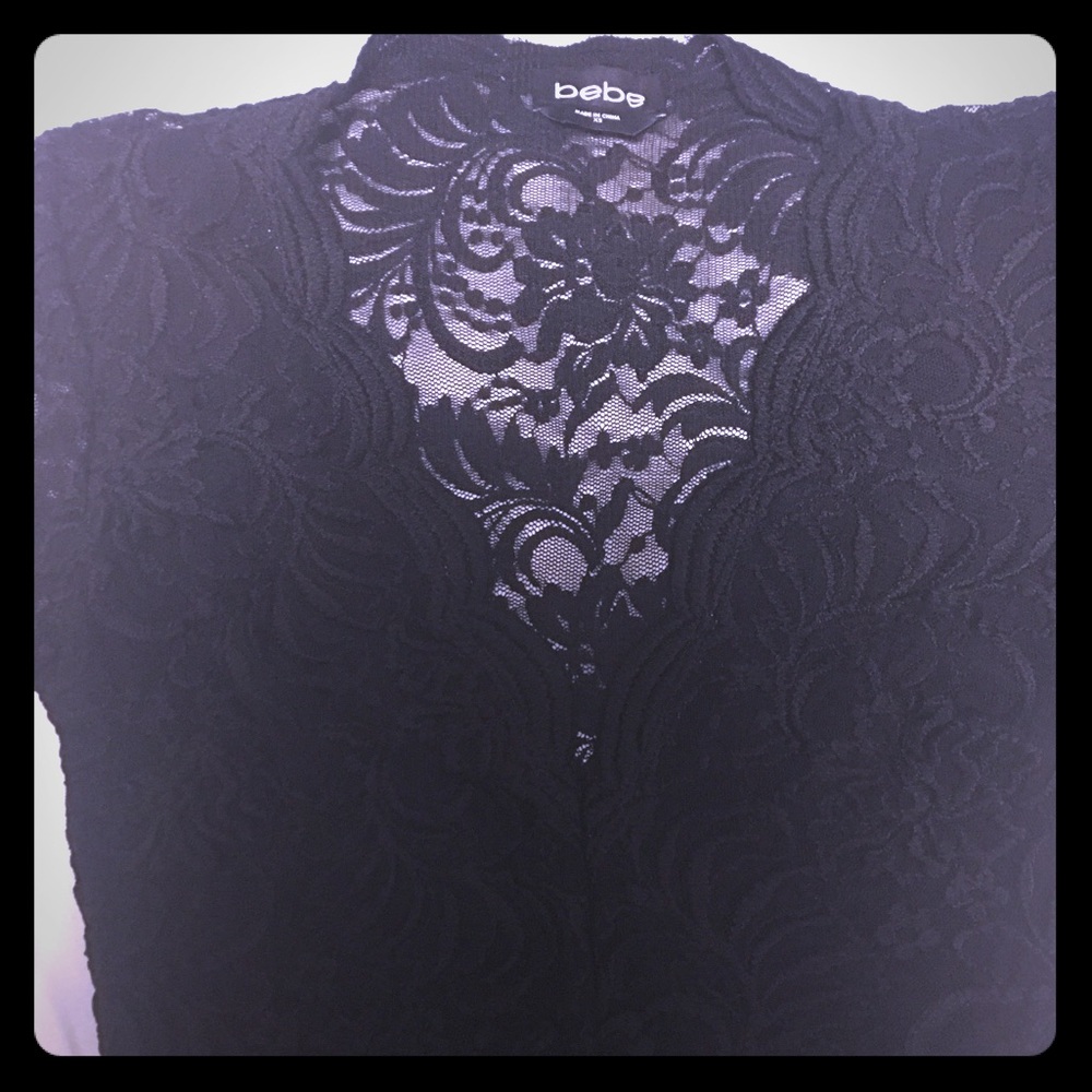 Bebe one piece shirt.