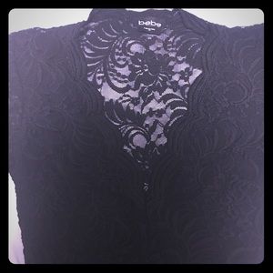 Bebe one piece shirt.