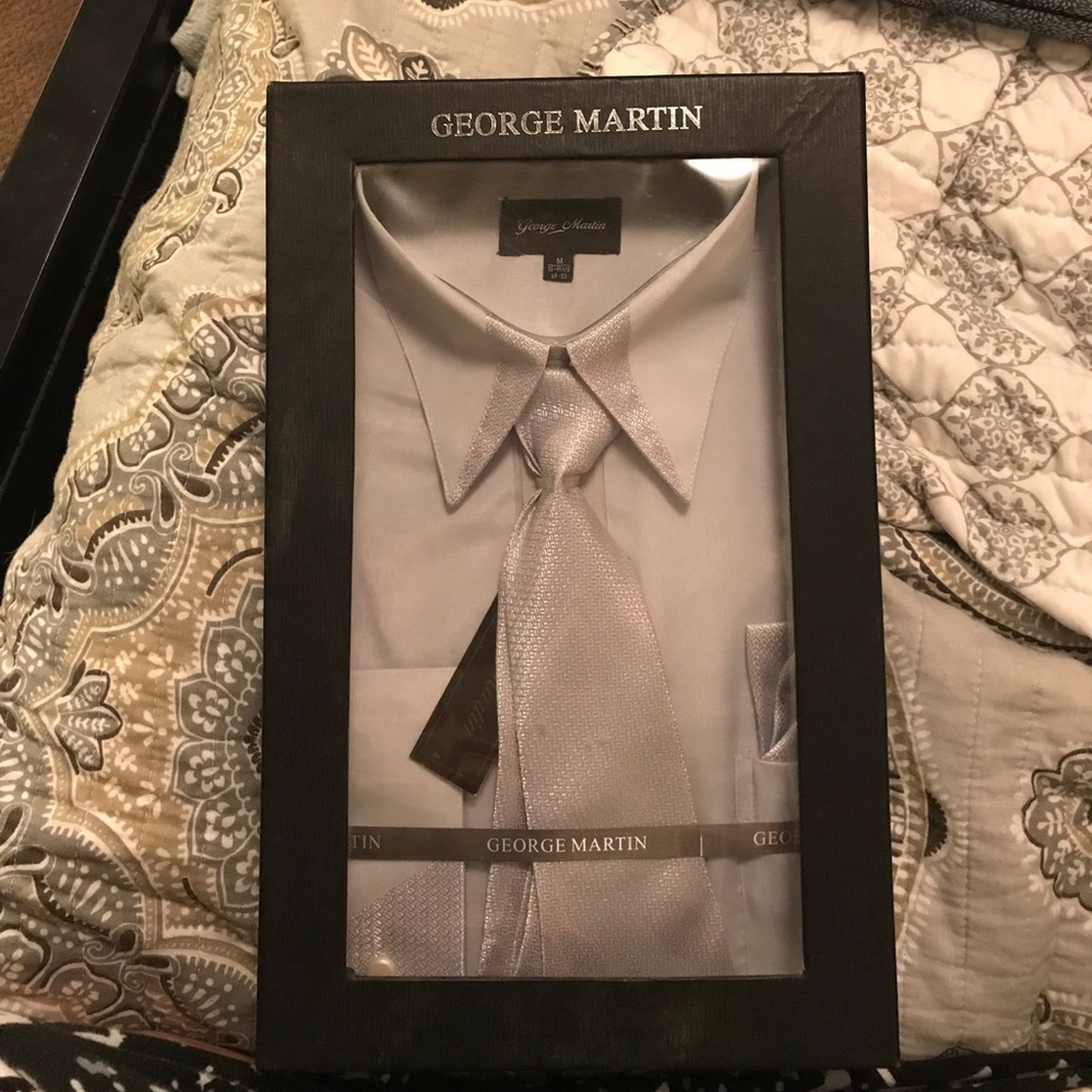 Brand new men's dress shirt and tie.