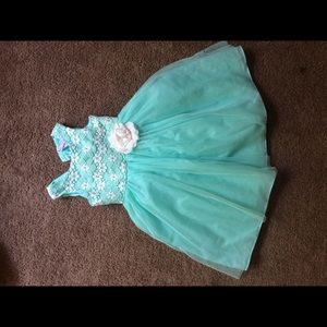 Light blue/turquoise girls dress.