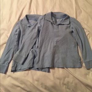 Two long sleeve light blue polos