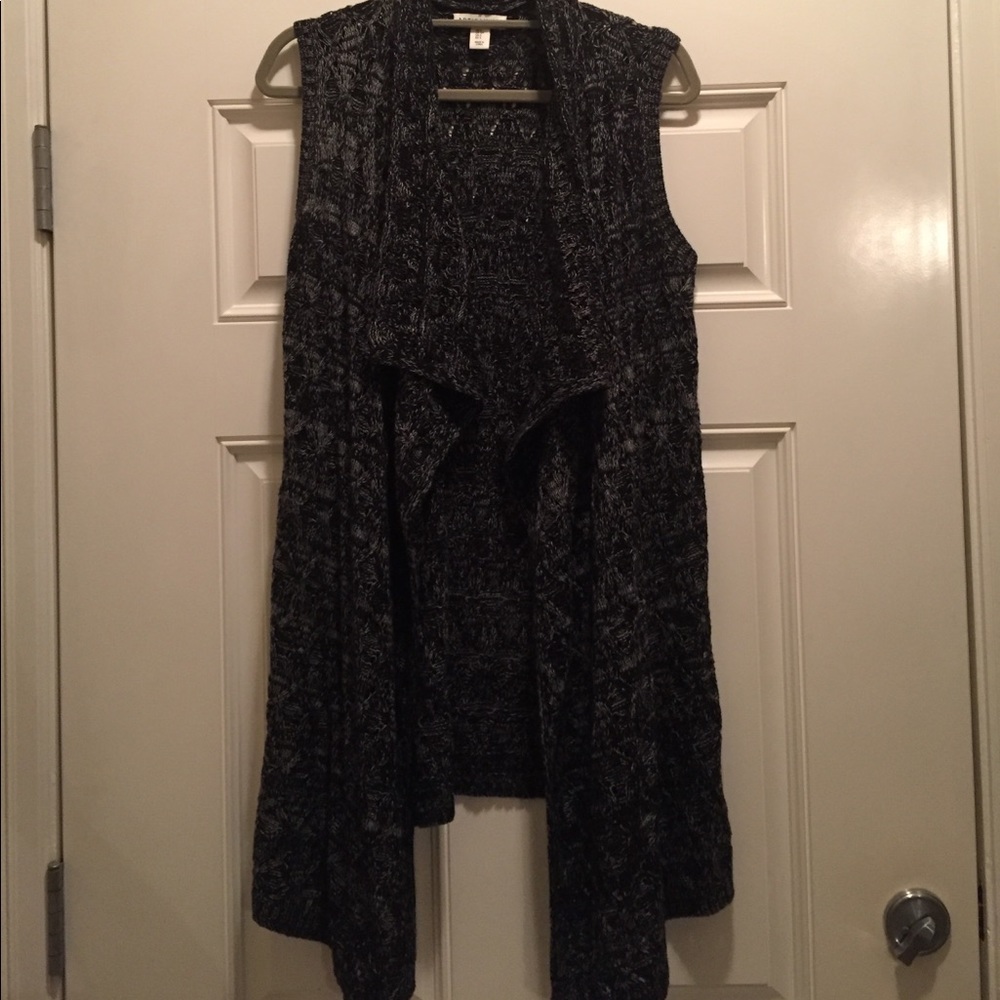 Knit sweater vest.